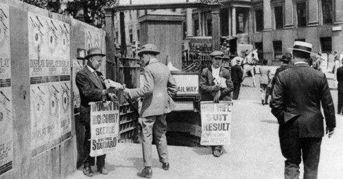 The lunchtime newspaper paper headlines, Trafalgar Square, London, 1926-1927. Artist: Unknown