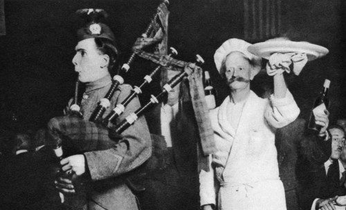 Presentation of the haggis at a Caledonian banquet, London, 1926-1927. Artist: Unknown