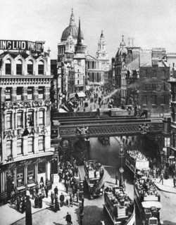 The spire of St Martin, Ludgate silhouetted against the bulk of St Paul's, London, 1926-1927. Artist: Frith