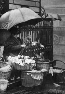 Flower seller, Piccadilly Circus, London, 1926-1927. Artist: Unknown