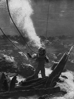 The first photograph of a diver under water, late 19th century, (c1920). Artist: Unknown