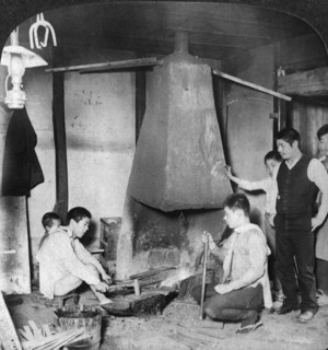A Japanese blacksmith at his forge, Yokohama, Japan, 1904.Artist: Underwood & Underwood