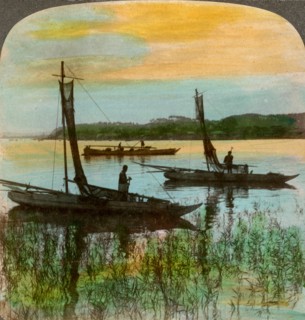Fishing boats at sunset near Yokohama, Japan, 1904.Artist: Underwood & Underwood