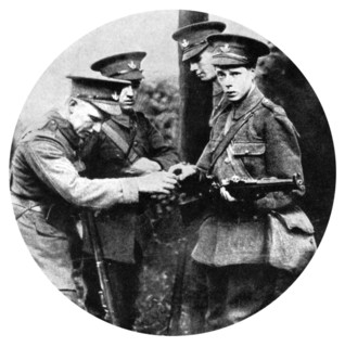 The Prince of Wales loading a rifle in the Grenadiers, First World War, 1914. Artist: Unknown