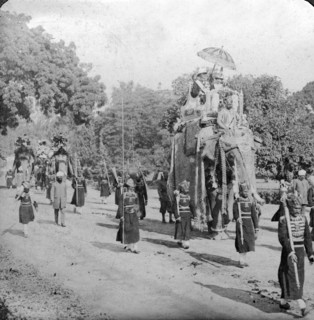 Lord and Lady Harding riding an elephant, India, 1913.Artist: HD Girdwood