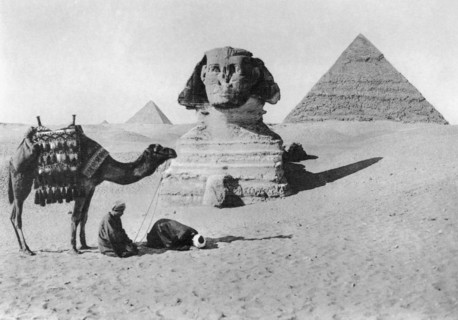 Praying before a sphinx, Cairo, Egypt, c1920s. Artist: Unknown