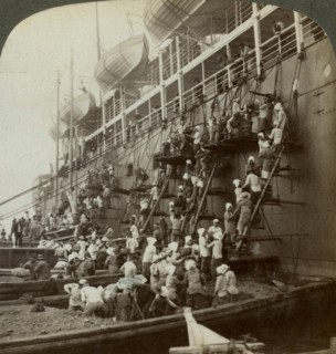 Coaling the Pacific mail SS 'Siberia', at the fortified naval station of Nagasaki, Japan, 1904. Artist: Underwood & Underwood