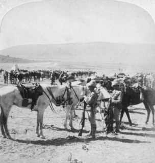 Australian Mounted Rifles after a skirmish at the Modder River, South Africa, 12th January 1900.Artist: Underwood & Underwood