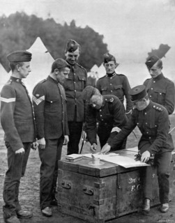 Settling accounts among the militiamen, 1896. Artist: Gregory & Co