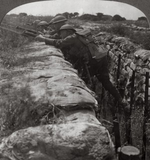 Canadians leaving their trenches to rush a German position, World War I, 1914-1918.Artist: Realistic Travels Publishers