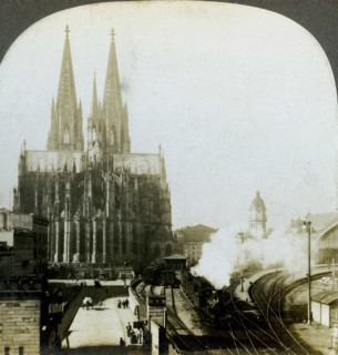 Cologne Cathedral from a railway bridge, Cologne, Germany.Artist: EW Kelley