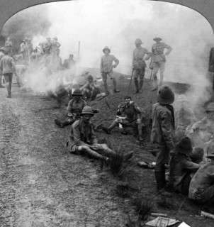 Early morning camp fires and breakfast, Persian Gulf, World War I, 1914-1918.Artist: Realistic Travels Publishers