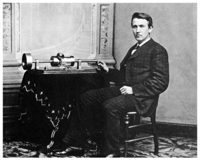 Thomas Alva Edison, American inventor, with his phonograph, c1878 (1955). Artist: Unknown