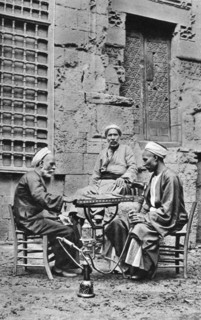 Men relaxing, Cairo, Egypt, c1922. Artist: Donald McLeish