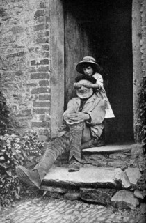 A child with her grandfather, England, c1922.Artist: AW Cutler