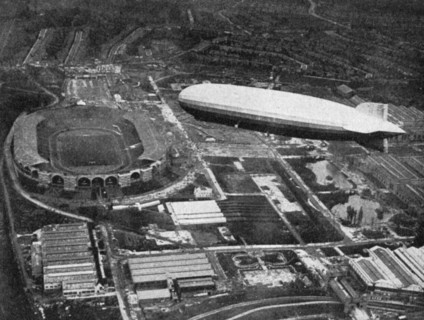 German airship 'Graf Zeppelin' flying over Wembley during the FA Cup Final, London, 1930.Artist: Central Press
