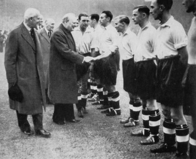 Winston Churchill greets the England football team, Wembley, London, October 1941.Artist: London News Agency