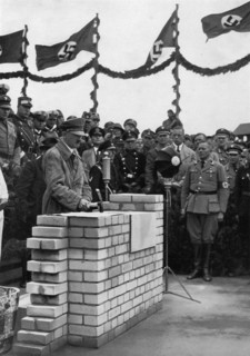 The Führer puts the foundation wall to the meeting house in the Adolf-Hitler-Koog. Artist: Unknown