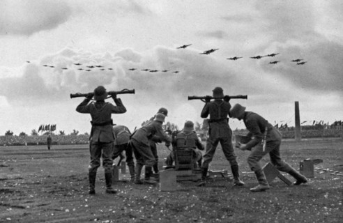 Flak batteries put on a show at the Nuremberg Rally, Germany, 1935. Artist: Unknown