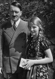 A young girl asks Adolf Hitler for his autograph, 1936. Artist: Unknown