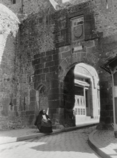 Gateway and entrance to the only street of Mont St Michel, Normandy, France, 20th century. Artist: Unknown