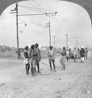 Men about to draw a heavy load, Rangoon, Burma, 1908. Artist: Stereo Travel Co