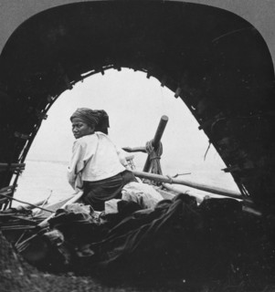 A boatman on the Irrawaddy River, Burma, 1908. Artist: Stereo Travel Co