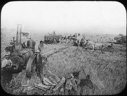 Harvest scene on the North American prairies, late 19th or early 20th century. Artist: George Philip & Son Ltd