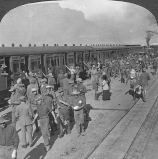 Soldiers of the Wiltshire Rifles boarding a train, Cape Town, South Africa, World War I, c1915. Artist: Realistic Travels Publishers