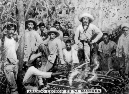 Roasting pig in the jungle, Cuba, (c1910). Artist: Unknown