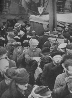 'Snatched from Norway, the Prisoners Come Aboard', 1941.  Artist: Unknown.