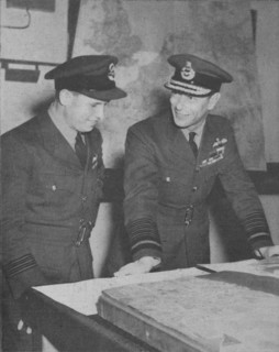 'H.M. The King learns details of the R.A.F. raid on the Ruhr dams on May 17, 1943', 1943-44. Artist: Unknown.