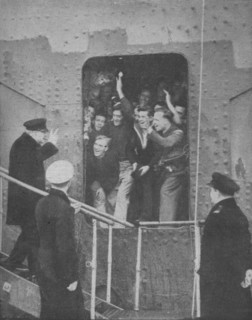'Mr. Churchill gives the V-Sign to cheering members of the ship's crew', 1943-1944. Artist: Unknown.
