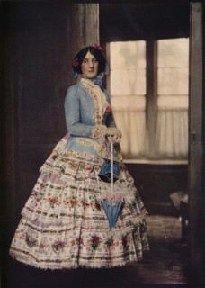 'An embroidered coat, with a lovely silk gauze skirt. In fashion between 1850 and 1860', c1913. Artist: Unknown.
