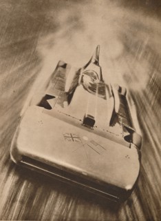Sir Malcolm Campbell at high speed in `Blue Bird`, 1935. Artist: Unknown.