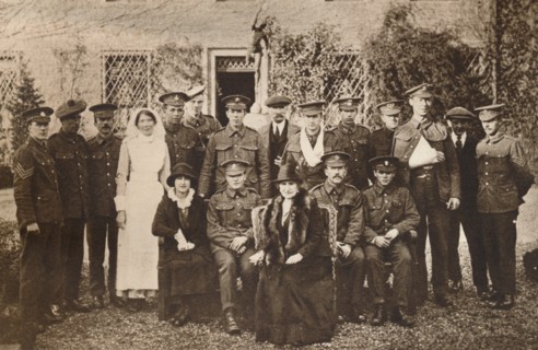 'Lady Elizabeth with Countess of Strathmore and convalescent wounded soldiers', 1916 Creator: Unknown.