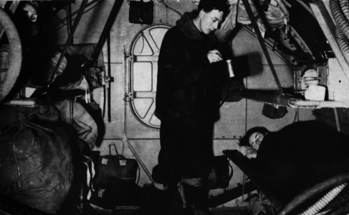 An RAF rigger serving breakfast at 6.30 am, c1940 (1943). Artist: Unknown.
