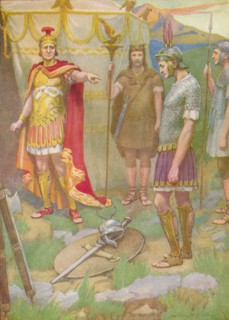 'The youth laid the arms he had taken from his foe at his father's feet', c1912 (1912). Artist: Ernest Dudley Heath.