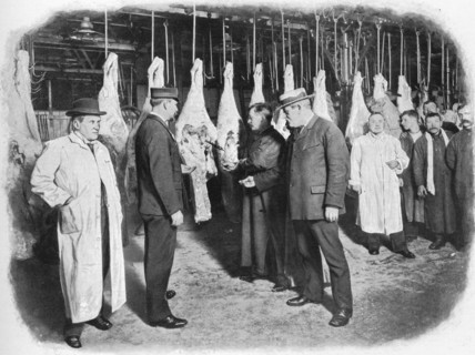Inspecting meat at Smithfield Market, City of London, c1903 (1903). Artist: Unknown.