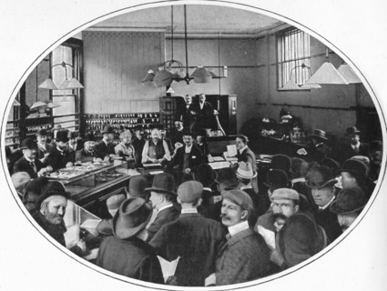 Sale of unredeemed goods at Debenham, Storr and Sons auction rooms, London, c1903 (1903). Artist: Unknown.