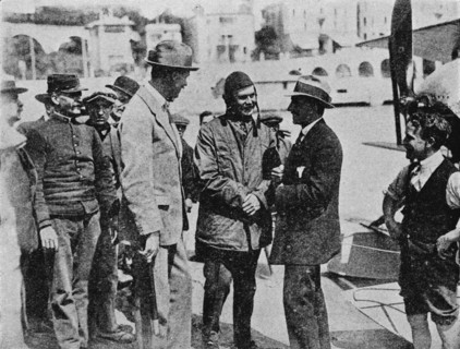 The Schneider Trophy: Howard Pixton talking to Jacques Schneider after his victory, 1914 (1934). Artist: Flight Photo.