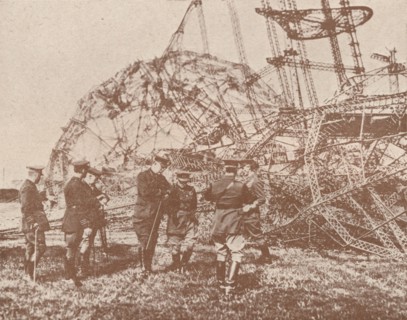 British staff officers examining the wreckage of a Zeppelin brought down in England, c1917 (1919). Artist: Unknown.