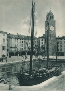 Harbour and Torre Apponale, Riva del Garda, Italy, 1927. Artist: Eugen Poppel.