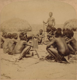 'Braves of a Zulu Village holding a Council, near the Umlaloose River, Zululand, S.A.', 1901. Artist: Unknown.