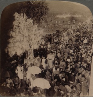 ''Shinto procession carrying sacred objects over bridge to Imperial Museum, Kyoto, Japan', 1904. Artist: Unknown.