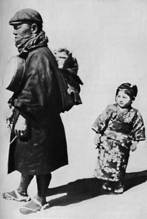 ''With his drum and monkey he is Japan's equivalent to our old-style organ grinder', c1900, (1921).  Artist: Julian Leonard Street.