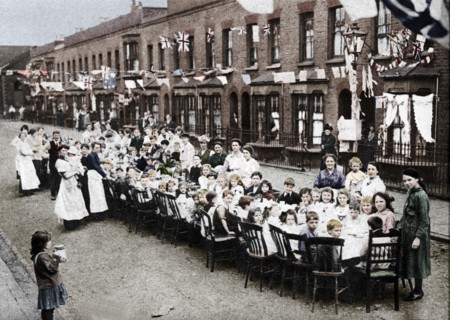 ' A children's tea party in an East End Street in London, to celebrate the Treaty of Versailles at t Artist: Unknown.
