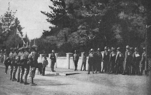 'Grenadier Guards (with their new hats) relieving guard at Lord Roberts's headquarters, Pretoria', 1 Artist: Unknown.