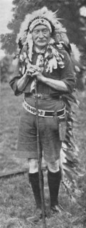 Sir Robert Baden-Powell, arrayed in the dress of a Red Indian tribe', c1925