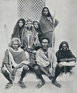 Group of Danakil men and women from the Italian port, Assab Bay, Eritrea, 1912. Artist: Unknown.